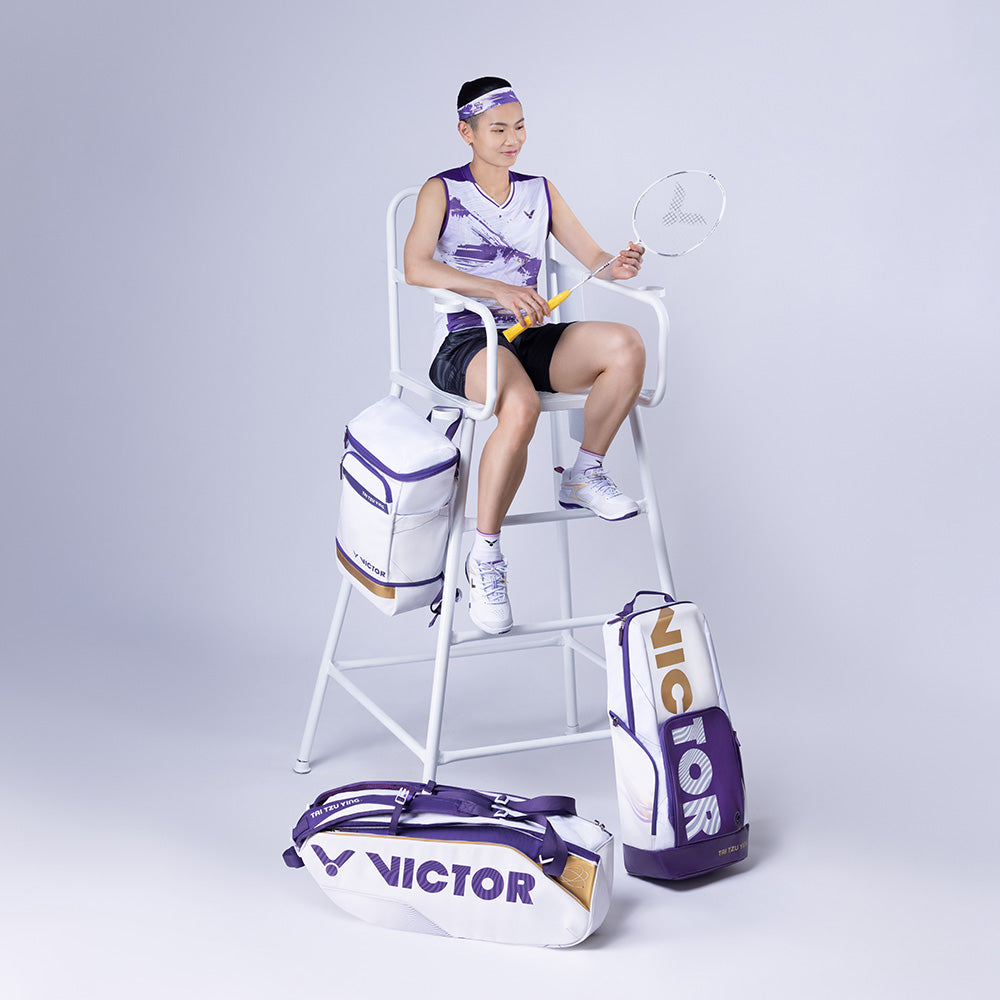BR 3825 TTY AJ backpack, badminton sports bag, racket storage backpack, shoe compartment, double shoulder straps, water bottle pockets, accessory pouches, polyester PU material, bright white and purple, durable sports backpack, ergonomic design, tournament bag, multi-compartment bag, breathable back panel, sports gear bag